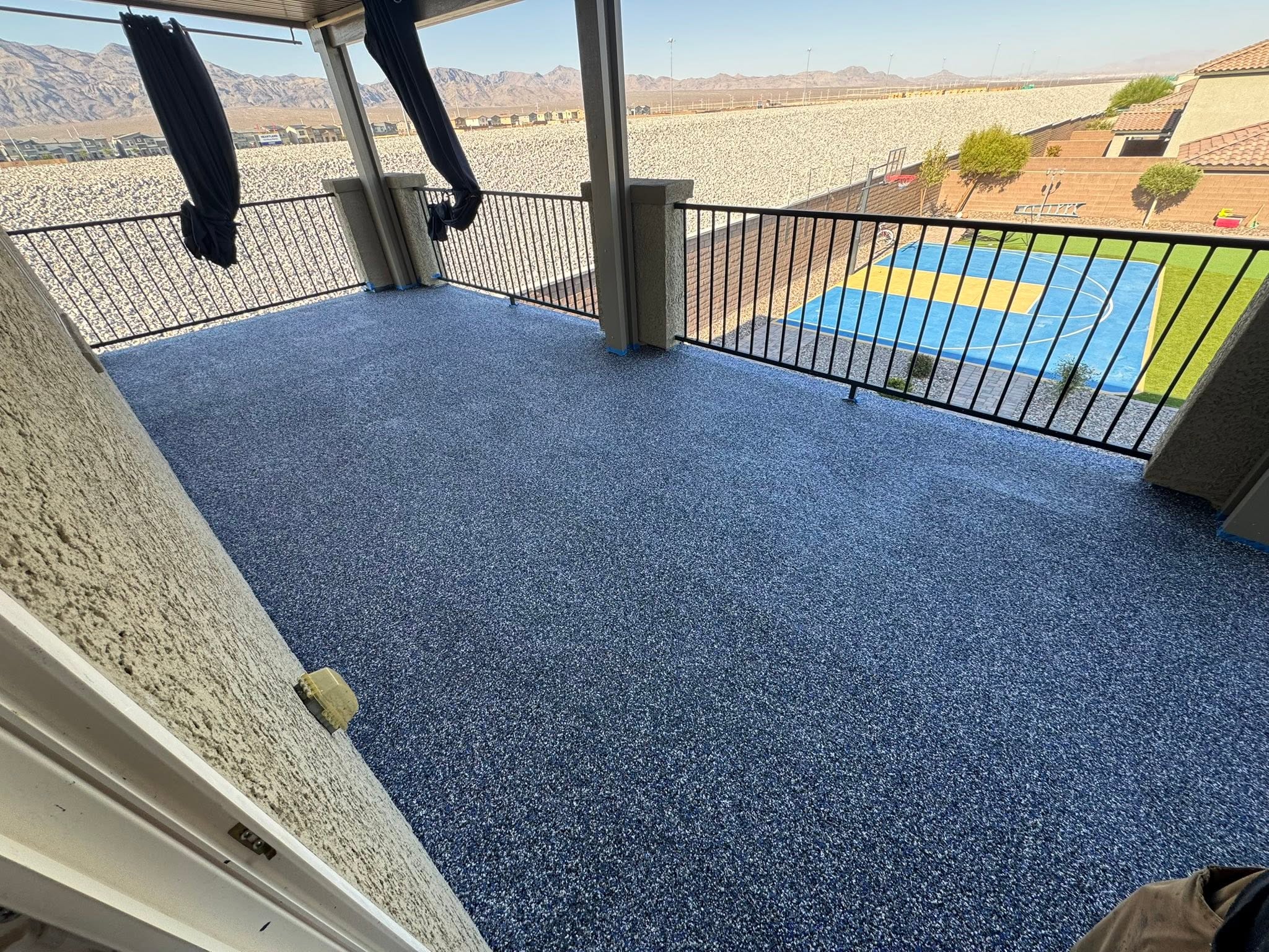 Concrete balcony with pool view — Las Vegas outdoor project