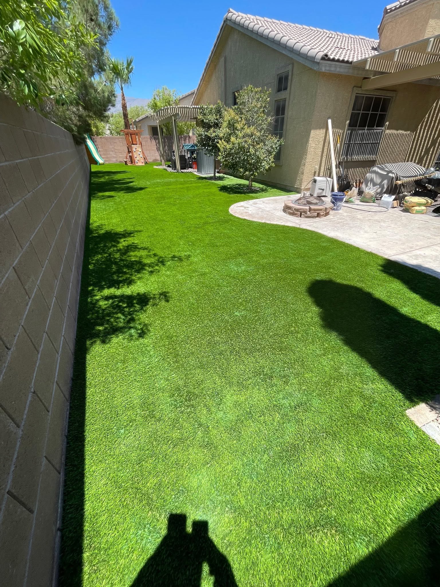 Backyard transformation Las Vegas — artificial turf and concrete